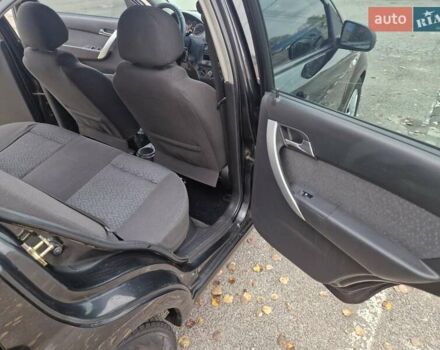 Черный Шевроле Авео, объемом двигателя 1.5 л и пробегом 256 тыс. км за 4600 $, фото 14 на Automoto.ua