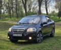 Черный Шевроле Авео, объемом двигателя 1.4 л и пробегом 213 тыс. км за 3499 $, фото 1 на Automoto.ua