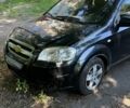 Черный Шевроле Авео, объемом двигателя 1.5 л и пробегом 243 тыс. км за 3500 $, фото 1 на Automoto.ua