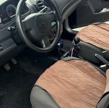 Черный Шевроле Авео, объемом двигателя 1.5 л и пробегом 205 тыс. км за 4200 $, фото 4 на Automoto.ua