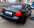Черный Шевроле Авео, объемом двигателя 15 л и пробегом 260 тыс. км за 2500 $, фото 1 на Automoto.ua