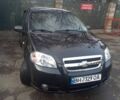 Черный Шевроле Авео, объемом двигателя 1.4 л и пробегом 250 тыс. км за 3300 $, фото 1 на Automoto.ua