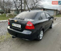 Черный Шевроле Авео, объемом двигателя 1.5 л и пробегом 250 тыс. км за 3350 $, фото 2 на Automoto.ua
