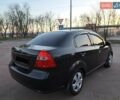 Чорний Шевроле Авео, об'ємом двигуна 1.5 л та пробігом 275 тис. км за 4300 $, фото 4 на Automoto.ua