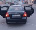 Черный Шевроле Авео, объемом двигателя 1.5 л и пробегом 199 тыс. км за 3500 $, фото 1 на Automoto.ua