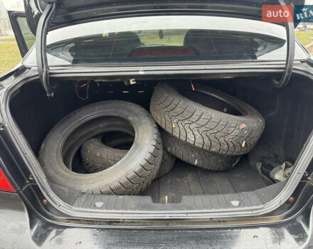 Черный Шевроле Авео, объемом двигателя 1.5 л и пробегом 225 тыс. км за 3999 $, фото 11 на Automoto.ua