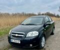 Черный Шевроле Авео, объемом двигателя 1.5 л и пробегом 180 тыс. км за 4800 $, фото 1 на Automoto.ua