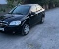 Черный Шевроле Авео, объемом двигателя 1.5 л и пробегом 250 тыс. км за 4000 $, фото 1 на Automoto.ua
