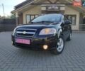 Черный Шевроле Авео, объемом двигателя 1.4 л и пробегом 183 тыс. км за 4950 $, фото 1 на Automoto.ua