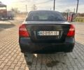 Черный Шевроле Авео, объемом двигателя 1.4 л и пробегом 300 тыс. км за 2900 $, фото 1 на Automoto.ua