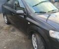 Черный Шевроле Авео, объемом двигателя 1.5 л и пробегом 148 тыс. км за 3300 $, фото 4 на Automoto.ua