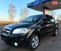 Черный Шевроле Авео, объемом двигателя 1.5 л и пробегом 275 тыс. км за 4300 $, фото 1 на Automoto.ua
