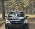 Черный Шевроле Авео, объемом двигателя 1.4 л и пробегом 203 тыс. км за 4850 $, фото 1 на Automoto.ua