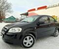 Черный Шевроле Авео, объемом двигателя 1.5 л и пробегом 213 тыс. км за 3900 $, фото 1 на Automoto.ua