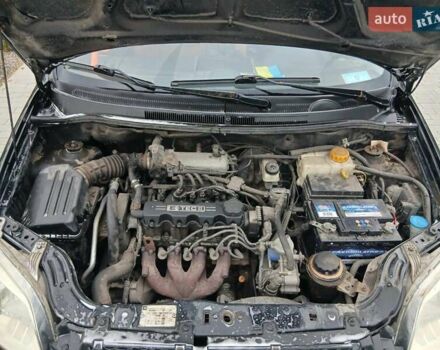 Черный Шевроле Авео, объемом двигателя 1.5 л и пробегом 206 тыс. км за 3900 $, фото 12 на Automoto.ua