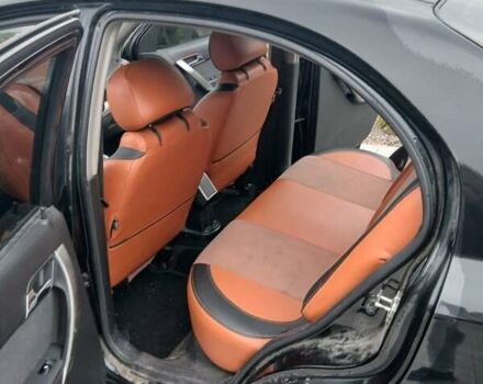 Черный Шевроле Авео, объемом двигателя 1.5 л и пробегом 206 тыс. км за 3900 $, фото 22 на Automoto.ua