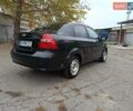 Черный Шевроле Авео, объемом двигателя 1.4 л и пробегом 240 тыс. км за 3200 $, фото 2 на Automoto.ua
