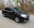 Черный Шевроле Авео, объемом двигателя 1.5 л и пробегом 215 тыс. км за 3350 $, фото 1 на Automoto.ua