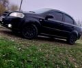 Черный Шевроле Авео, объемом двигателя 1.5 л и пробегом 218 тыс. км за 4000 $, фото 1 на Automoto.ua