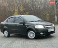 Черный Шевроле Авео, объемом двигателя 1.5 л и пробегом 249 тыс. км за 4300 $, фото 1 на Automoto.ua