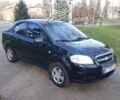 Черный Шевроле Авео, объемом двигателя 1.5 л и пробегом 196 тыс. км за 4000 $, фото 1 на Automoto.ua