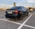 Чорний Шевроле Авео, об'ємом двигуна 1.5 л та пробігом 348 тис. км за 2900 $, фото 4 на Automoto.ua