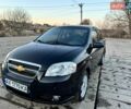 Черный Шевроле Авео, объемом двигателя 1.4 л и пробегом 194 тыс. км за 5200 $, фото 1 на Automoto.ua