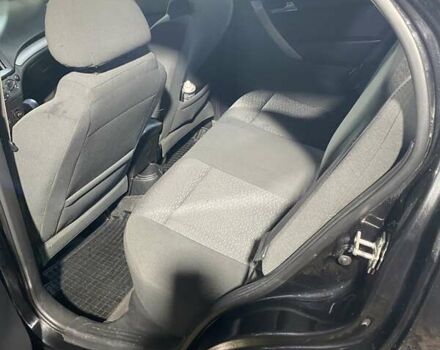 Черный Шевроле Авео, объемом двигателя 1.5 л и пробегом 145 тыс. км за 5000 $, фото 5 на Automoto.ua