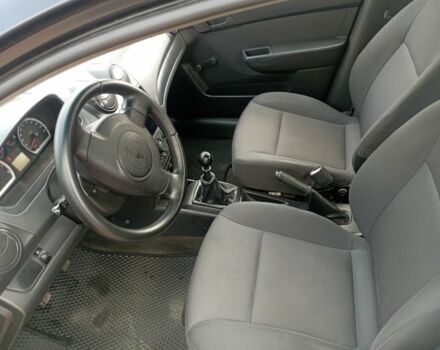 Черный Шевроле Авео, объемом двигателя 1.5 л и пробегом 205 тыс. км за 4100 $, фото 2 на Automoto.ua