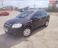 Черный Шевроле Авео, объемом двигателя 1.5 л и пробегом 150 тыс. км за 3999 $, фото 1 на Automoto.ua