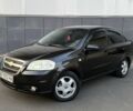 Черный Шевроле Авео, объемом двигателя 1.5 л и пробегом 228 тыс. км за 4200 $, фото 1 на Automoto.ua