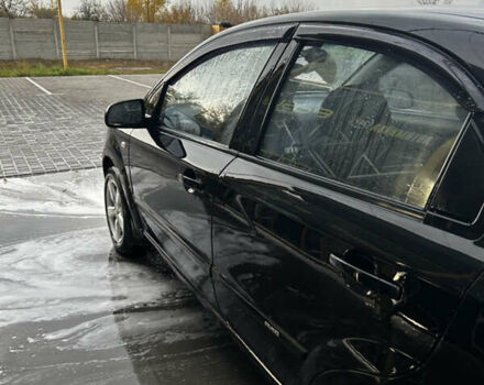 Черный Шевроле Авео, объемом двигателя 1.5 л и пробегом 145 тыс. км за 4200 $, фото 1 на Automoto.ua