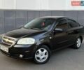 Чорний Шевроле Авео, об'ємом двигуна 1.5 л та пробігом 228 тис. км за 4200 $, фото 1 на Automoto.ua