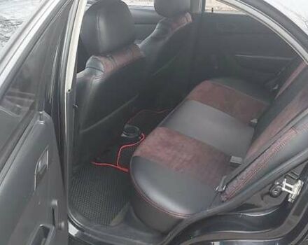 Черный Шевроле Авео, объемом двигателя 1.5 л и пробегом 196 тыс. км за 3800 $, фото 1 на Automoto.ua