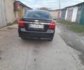 Черный Шевроле Авео, объемом двигателя 1.5 л и пробегом 250 тыс. км за 3500 $, фото 2 на Automoto.ua