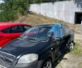 Черный Шевроле Авео, объемом двигателя 1.5 л и пробегом 280 тыс. км за 1000 $, фото 1 на Automoto.ua
