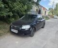 Черный Шевроле Авео, объемом двигателя 1.5 л и пробегом 262 тыс. км за 1999 $, фото 1 на Automoto.ua