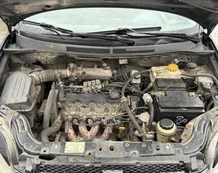 Черный Шевроле Авео, объемом двигателя 1.5 л и пробегом 300 тыс. км за 3100 $, фото 7 на Automoto.ua