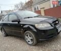 Черный Шевроле Авео, объемом двигателя 1.5 л и пробегом 300 тыс. км за 3000 $, фото 2 на Automoto.ua