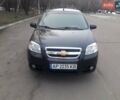 Черный Шевроле Авео, объемом двигателя 1.5 л и пробегом 140 тыс. км за 5600 $, фото 1 на Automoto.ua