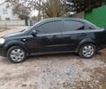 Черный Шевроле Авео, объемом двигателя 1.6 л и пробегом 200 тыс. км за 2800 $, фото 1 на Automoto.ua