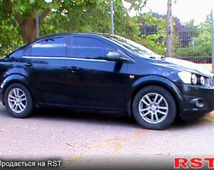Черный Шевроле Авео, объемом двигателя 1.6 л и пробегом 166 тыс. км за 6036 $, фото 3 на Automoto.ua