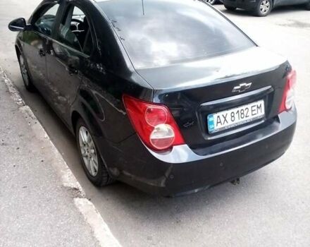 Черный Шевроле Авео, объемом двигателя 1.6 л и пробегом 180 тыс. км за 5000 $, фото 2 на Automoto.ua