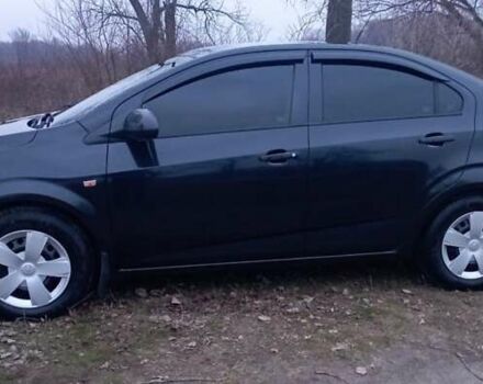 Черный Шевроле Авео, объемом двигателя 1.6 л и пробегом 168 тыс. км за 6700 $, фото 3 на Automoto.ua