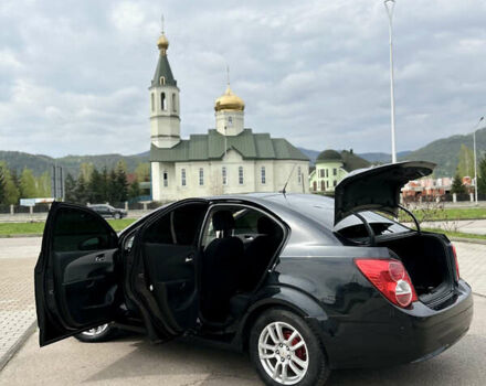 Черный Шевроле Авео, объемом двигателя 1.6 л и пробегом 180 тыс. км за 6600 $, фото 12 на Automoto.ua