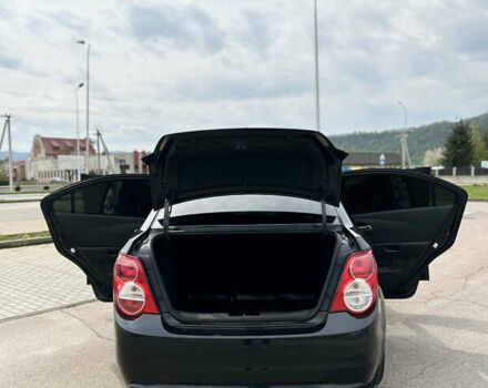 Черный Шевроле Авео, объемом двигателя 1.6 л и пробегом 180 тыс. км за 6600 $, фото 11 на Automoto.ua