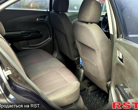 Черный Шевроле Авео, объемом двигателя 1.6 л и пробегом 191 тыс. км за 5800 $, фото 5 на Automoto.ua