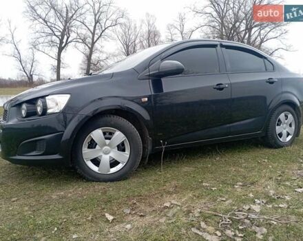 Черный Шевроле Авео, объемом двигателя 1.6 л и пробегом 168 тыс. км за 6700 $, фото 5 на Automoto.ua