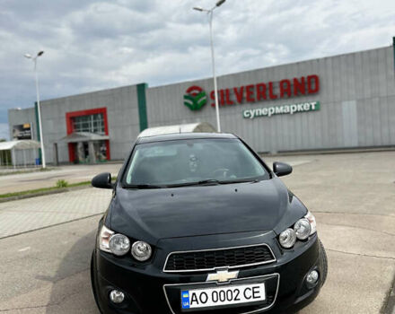 Черный Шевроле Авео, объемом двигателя 1.6 л и пробегом 180 тыс. км за 6600 $, фото 1 на Automoto.ua