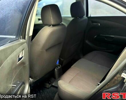 Черный Шевроле Авео, объемом двигателя 1.6 л и пробегом 191 тыс. км за 5800 $, фото 4 на Automoto.ua